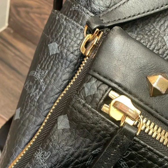 MCM Black Leather Backpack with Gold Accents display picture 1
